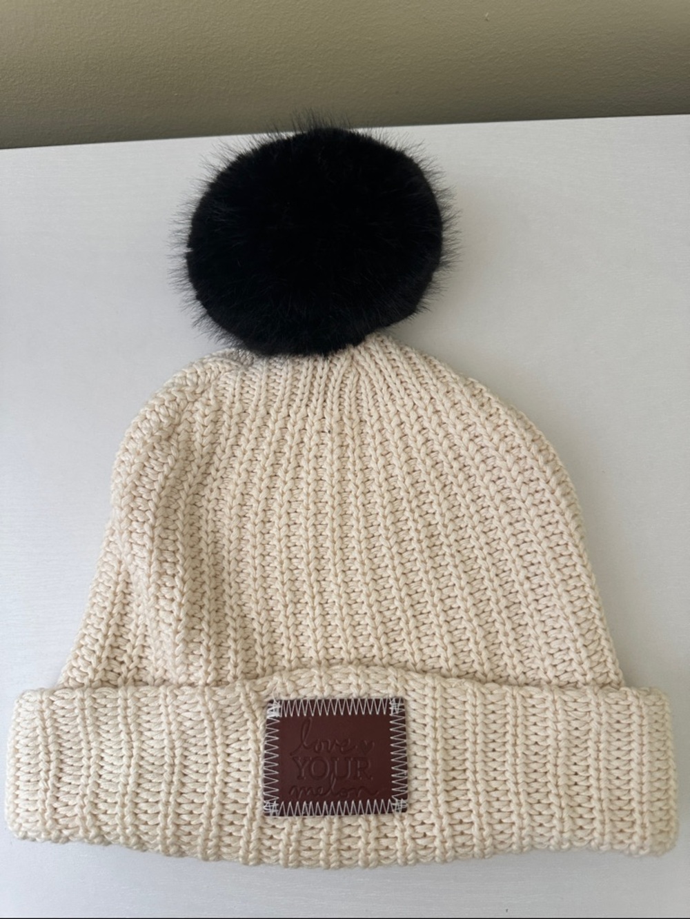 Love Your Melon Cream Knit Beanie with Black Pom Pom